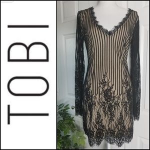 Lace nude and black cocktail dress